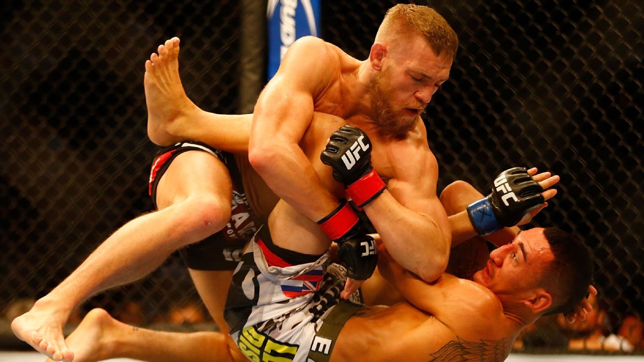 McGregor e Holloway: Relembrando o primeiro duelo no UFC